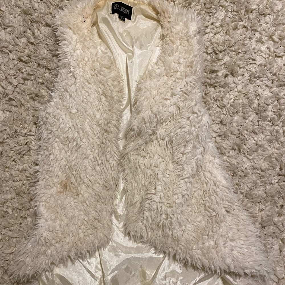 White fluffy vest